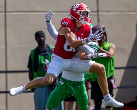 Josh Hoover throws 4 TD passes as No. 6 Indiana opens title defense with a 52-16 rout of North Texas