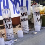Parents of San Diego mosque gunman say a mental health facility failed to heed FBI warning