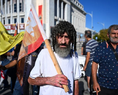 Greeks promised tax relief, wage hikes as protesters take to the streets over cost of living crunch