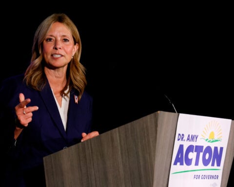 Armed man charged toward Democratic candidate for Ohio governor at fair, law enforcement says