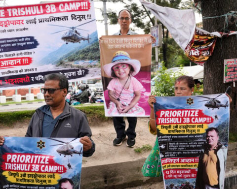 Nepal holds a day of mourning after floods kill 1,300