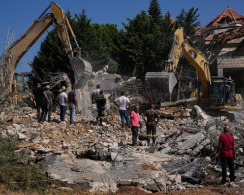 Israeli airstrikes on a village in southern Lebanon kill 9 people, wound 13