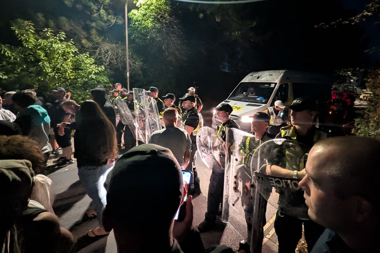 Why are far-right masked men protesting at British ports?