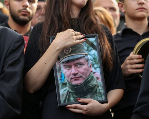 Funeral of convicted war criminal Mladic draws thousands, opens old wounds