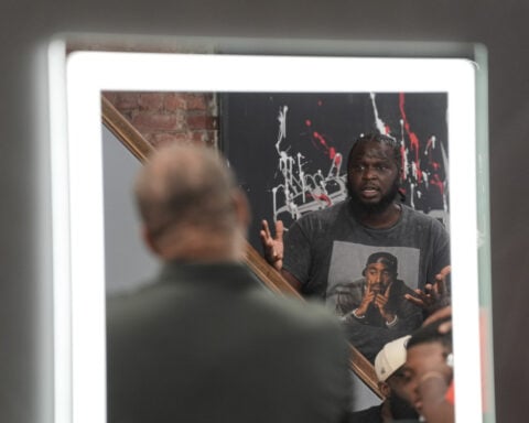 Inside a Philadelphia barbershop, Black men debate their political past and future