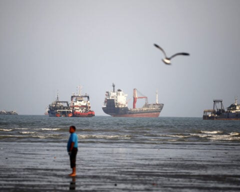 Iran reports commercial vessel struck in Strait of Hormuz