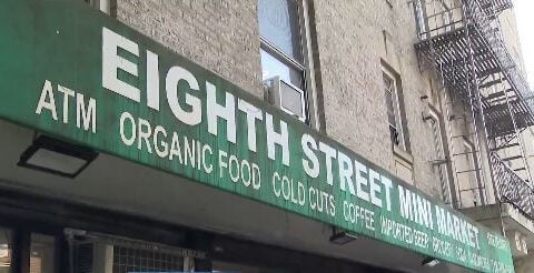 Surveillance video shows couple taking bodega cat