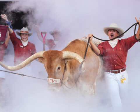 Top-ranked Texas likes the view from No. 1 but is focused on long season ahead