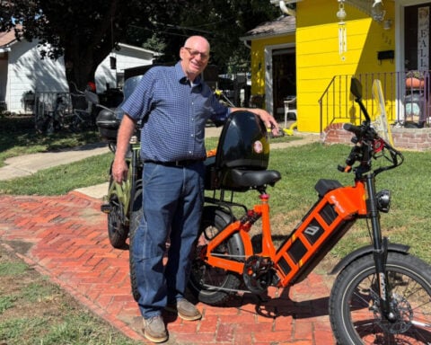 E-bike rider rides over 30K miles, continues tradition of helping drivers