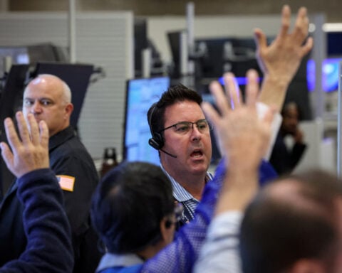 Wall Street ends lower as oil spikes and the benchmark Treasury yield breaches 5%