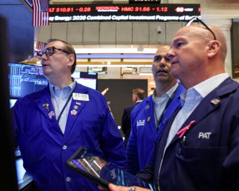 Stocks wobble but no sign of panic as yields surge