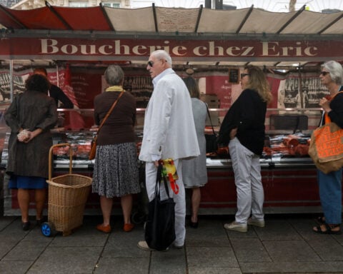 French central bank trims growth outlook as demand softens