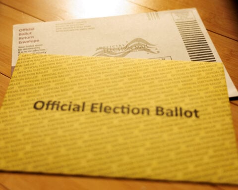 Trump keeps up attacks on mail voting, but election officials more confident