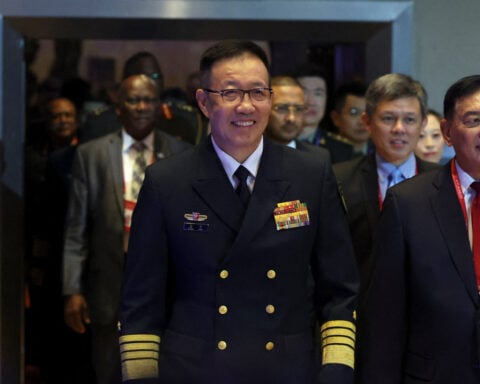 China defence minister urges nations to curb regressive historical trends