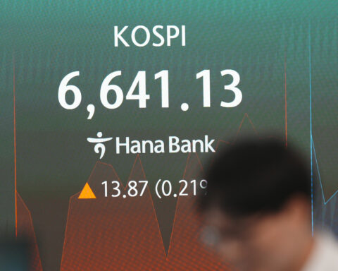 Asian stocks mostly higher ahead of Fed's interest rate decision