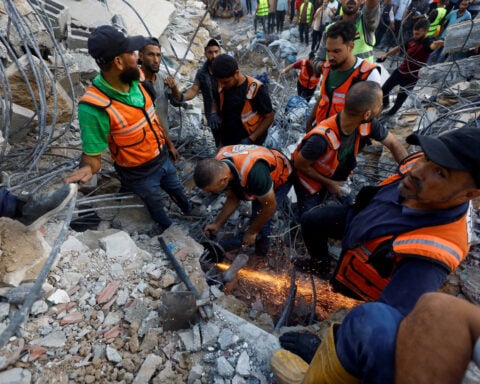 War-damaged Gaza building collapses, killing 20 people sheltering inside