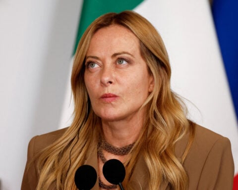 Italy's Meloni scraps road tax for most cars as election approaches