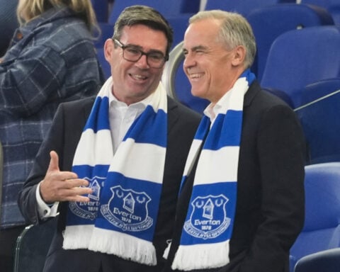 Canada’s Carney and Britain’s Burnham take first meeting to Everton football match