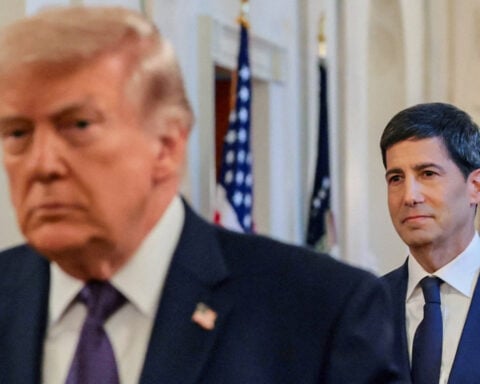 Trump lashes out at Fed after Warsh backs rate hike