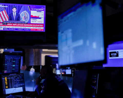 World stocks gain as Treasury yields retreat after Fed, BoE decisions