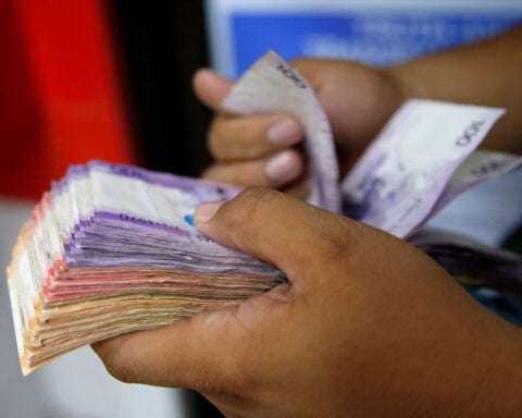Dollar's allure, oil surge fan bearish bets on emerging Asian currencies: Reuters poll