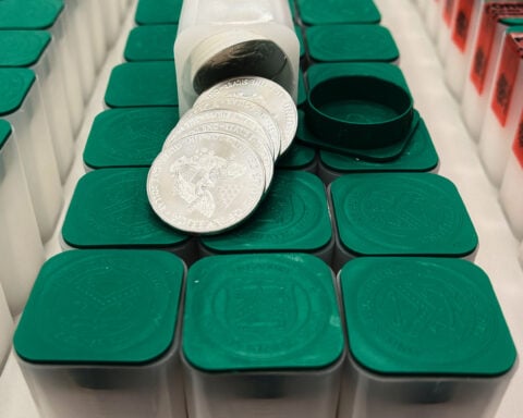 A tip about a swerving van leads police to 66,000 US silver coins in a fraud case