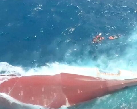 Indonesia recovers three bodies as effort begins to right capsized ship
