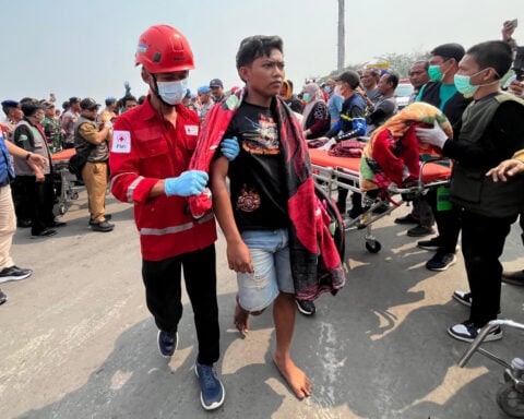 Indonesian divers recover 3 bodies from capsized ferry as salvage operation begins