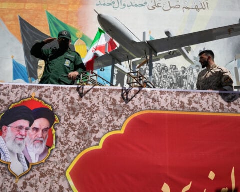 Hundreds of thousands attend Iran's biggest government-organized rally since the war began