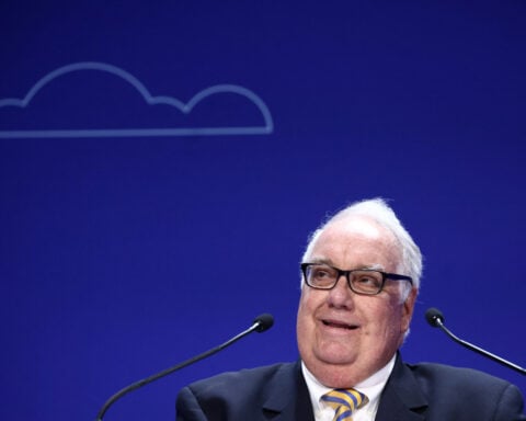 Warren Buffett steps down as Berkshire chairman, son Howard succeeds