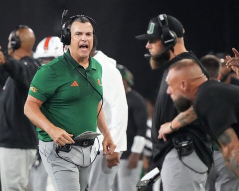 Mensah sets ACC consecutive-completions marks, defense rises in 4th as No. 5 Miami tops Wake Forest