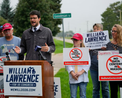 AI fears are fueling progressive Democrat's campaign in Michigan battleground district