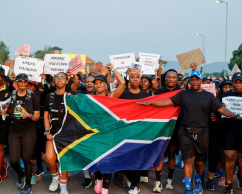 After deaths of nine women, South Africans gather to run, mourn and demand change