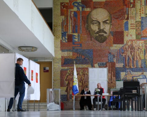 Russia reports online attacks on electoral system on second day of parliamentary vote