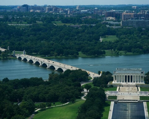 Trump says his planned arch would become a 'military complex' able to host drones and snipers
