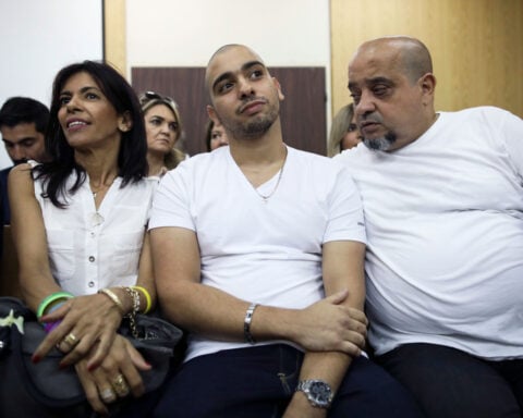Israeli president overrules military to pardon soldier who killed incapacitated Palestinian attacker