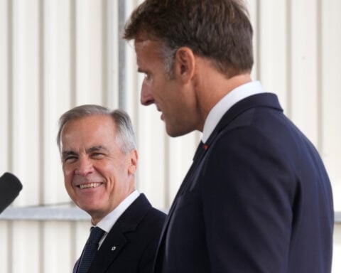 Macron backs Canada as EU associate member as Carney turns toward Europe