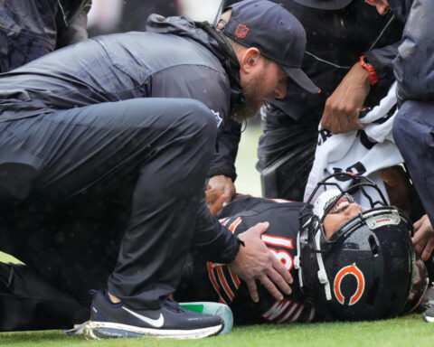 Bears quarterback Caleb Williams carted off with a right hamstring injury