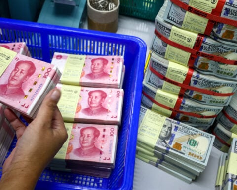 Yuan hits fresh multi-year peak as PBOC eases curb ahead of Trump-Xi summit