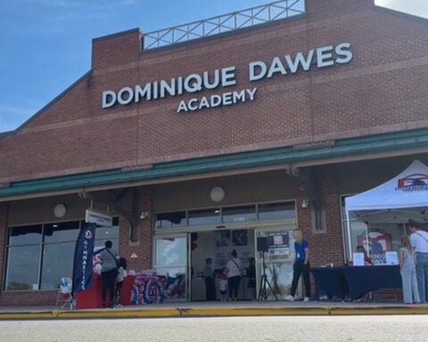 Olympic gold medalist Dominique Dawes opens gymnastics academy