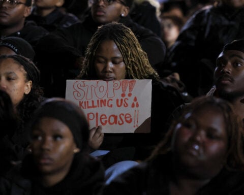 South African police arrest three people over woman's death after spate of killings