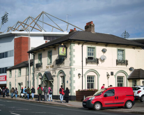 Cheers! Wrexham's celebrity owners buy 'The Turf' pub that's adjacent to the club's stadium