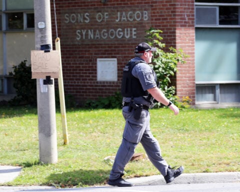 Up to 30 shots fired after man opened fire on officer outside Ontario synagogue