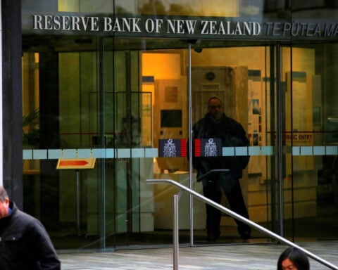 New Zealand central bank chief sees risks to economy, inflation