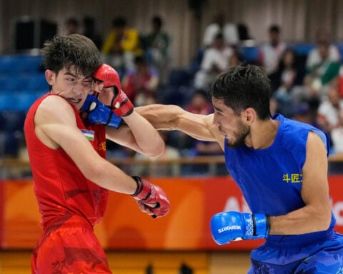 Mixed martial arts -- without the wire cage and the blood -- bids to make the Olympics
