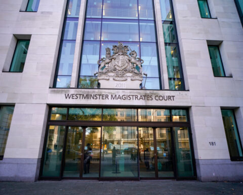 Rwandan doctor accused in London court of overseeing 6 killings in 1994 genocide