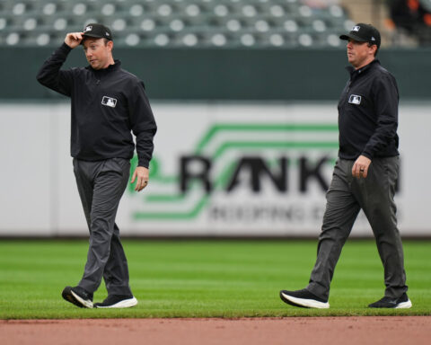 Twin brothers Austin and Tyler Jones ump big league games together for the first time