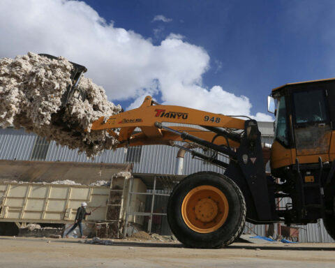 How firms linked to sanctioned Chinese cotton giant sell clothes to U.S