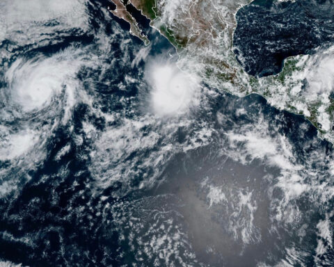 Powerful Hurricane Polo drenches Mexico's coast as Nolo takes aim at Hawaii