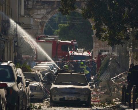 Blast near Acropolis in Greece injures 2, collapses a building. Local media say gas leak suspected